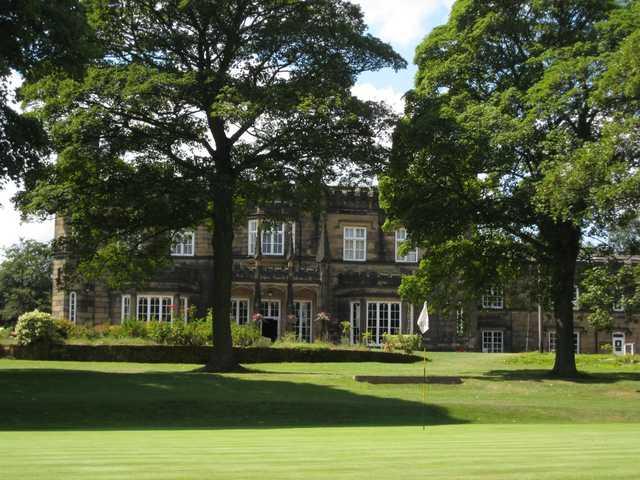 The 12th green with views of the beautiful clubhouse at Rotherham Golf Club