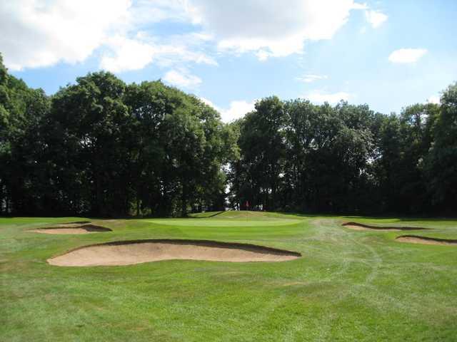 The 17th green and greenside bunkers at Rotherham Golf Club