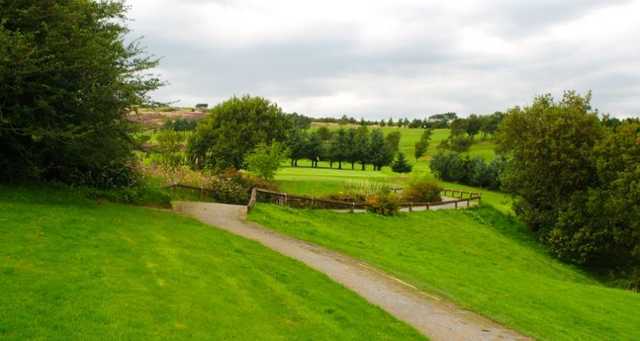 Buggy path winding through the pristine course at Darwen Golf Club