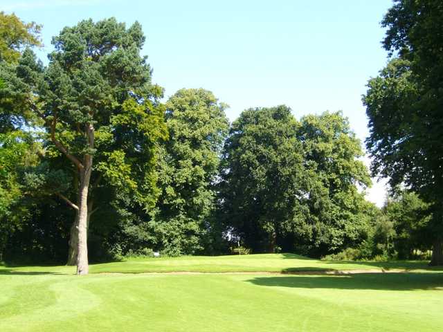 The 6th green at Eastham requires a shot over a bunker that lines the front of the green