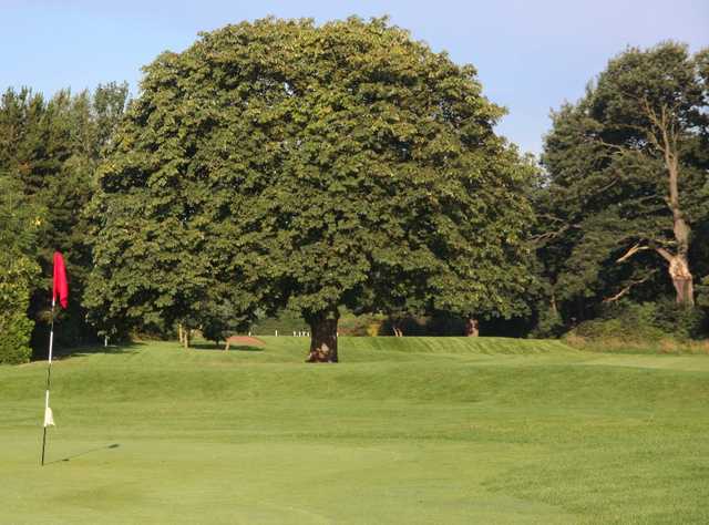 The 18th green at Eastham Lodge Golf Club