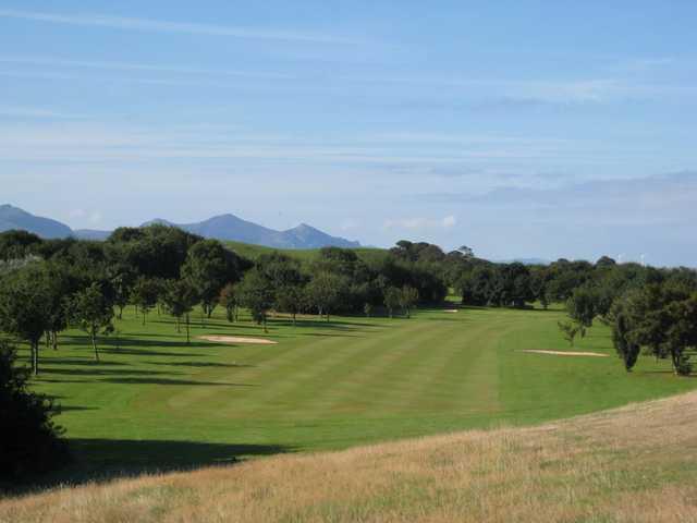 A view of the 16th fairway and surrounding mountains at  Caernarfon Golf Club