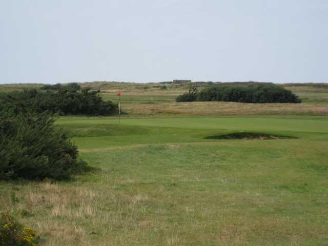 View of the 11th green and greenside bunker at Conwy Golf Club