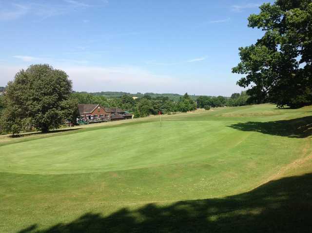 A view of the 18th green overlooking the clubhouse at Chipstead Golf Club