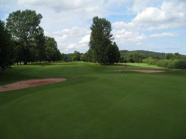 A view of the 5th green and treelined fairway at Bridgnorth Golf Club