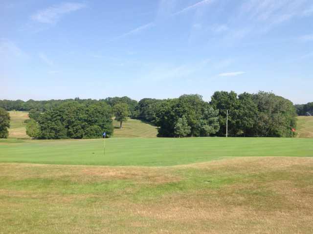 A scenic view of the 18th green at Hamptworth Golf Club