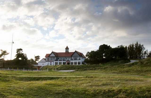 The 16th hole and stunning clubhouse at Hesketh Golf Club