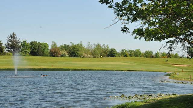 A view over one of the lakes at Witney to the 18th green.