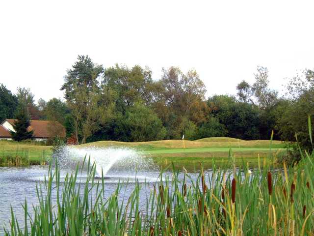 The 8th green including fountain at Orton Meadows Golf Club