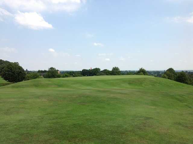 View of the 17th hole on a hill at The Welcombe Golf Club