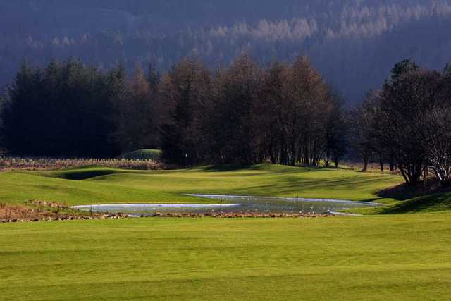 Water hazards on approach to the green