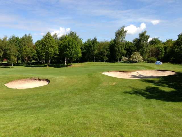 A bunker-guarded green at Puckrup Hall Golf Club