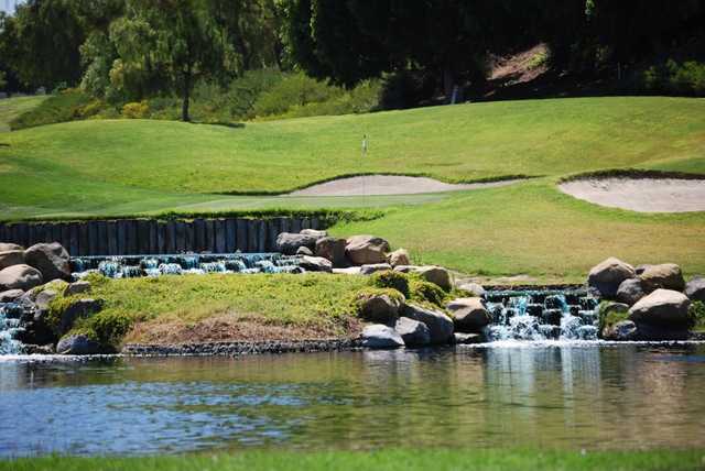 A view over the water of green at Enagic Golf Club at Eastlake