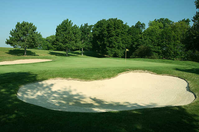 View of a green with two bunkers at Quicksilver Golf Club