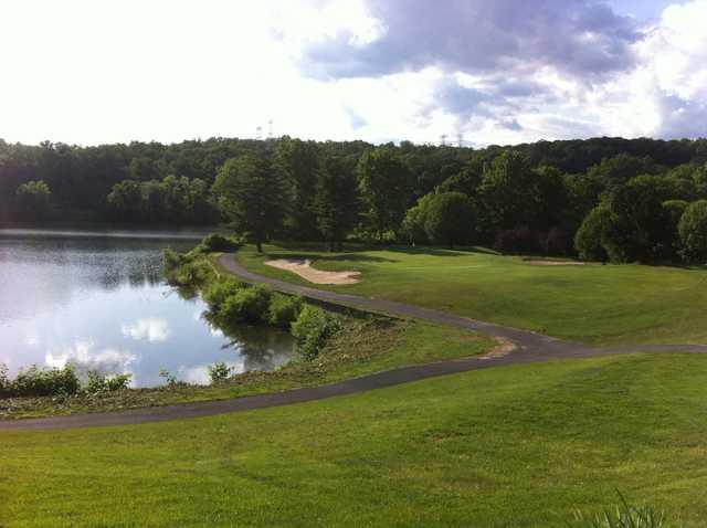 View of a green and lake at Sprain Lake Golf Course
