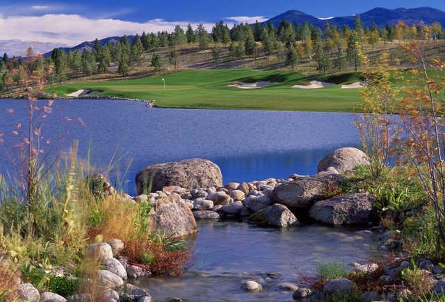 A view of a green with water coming into play at Stock Farm
