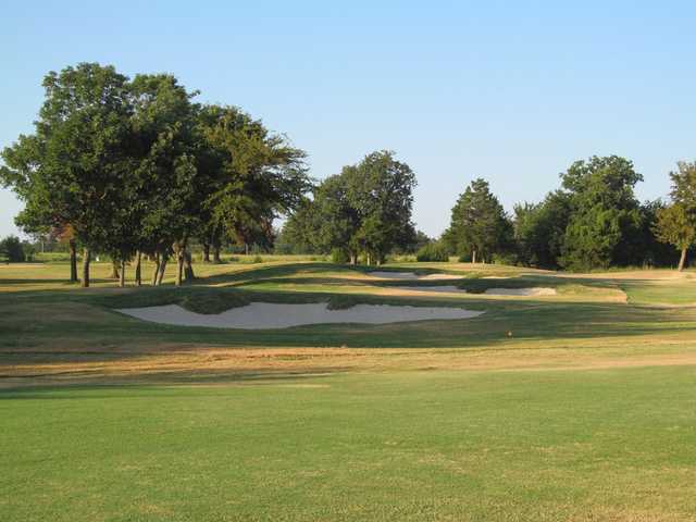 View of a green and bunkers at Arrowhead State Park Golf Course