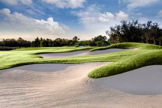 A view of a bunkered green at The Club Renaissance