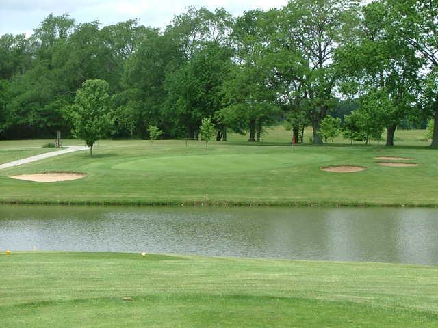 A view of green #6 with water and sand traps coming into play at Country Hills Golf Course