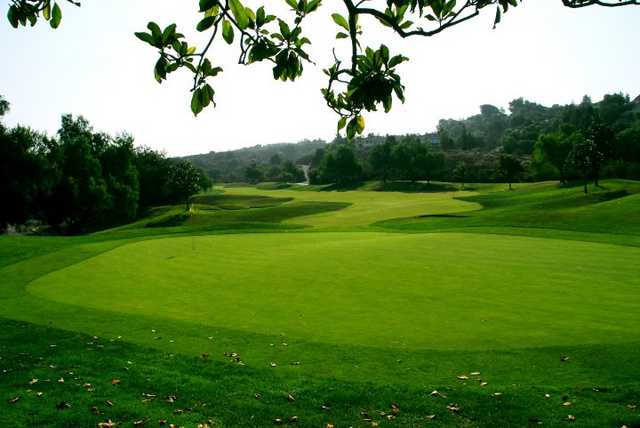 A view of the 11th hole from behind green towards rest of hole at Coyote Hills Golf Course