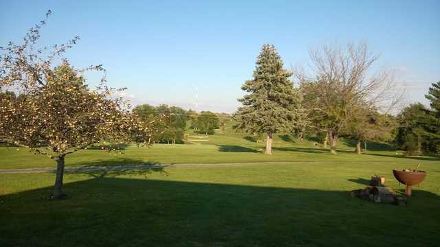 A sunny day view of a hole at Cedar Crest Country Club