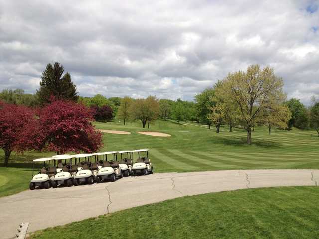 A view of a green protected by bunkers at Hills of Lenawee Golf Club & Banquet Center.