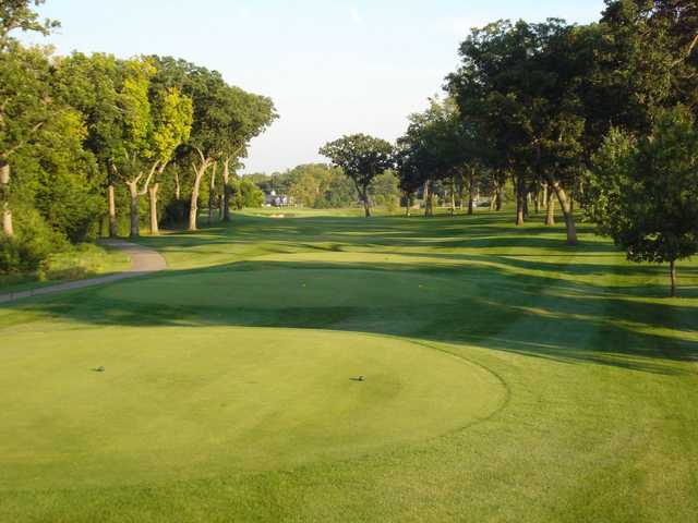 A sunny view of green #18 at Foxford Hills Golf Club.