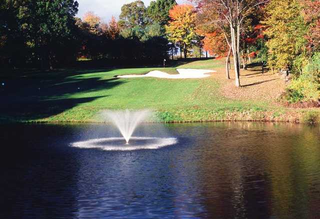 A view over the water of a green at Somers National Golf Club