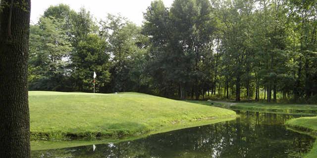 A green view surrounded by water at Gray Eagle Golf Club 