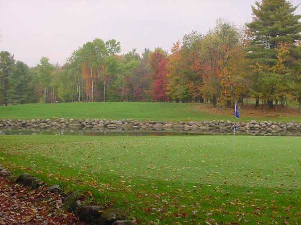 A view of hole #18 at Woodgate Pines Golf Club
