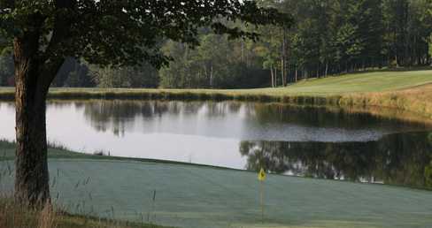 A view of a green with water coming into play at Chautauqua Golf Club