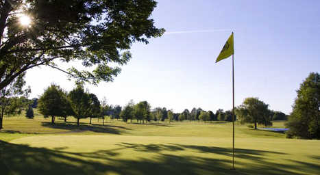 A sunny day view of a green at Chautauqua Golf Club