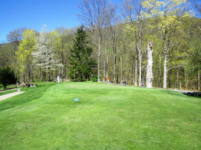 A splendid spring day view of a green at Undermountain Golf Course