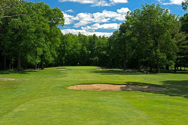 A view of a green protected by bunkers at Broadacres Golf Club