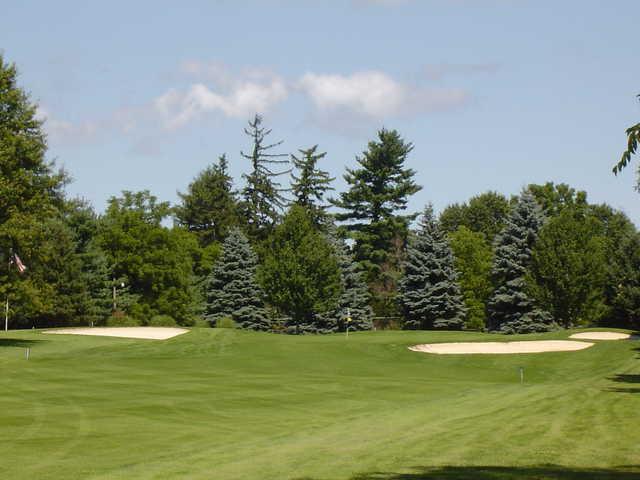 A view of the 9th green protected by bunkers at Trumansburg Golf Club