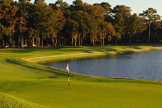 A fall day view of a green from Heron Point at Sea Pines Resort