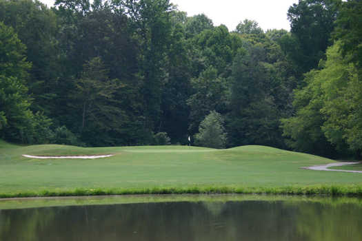 A view over the water of hole #2 at River Golf & Country Club