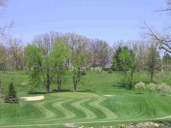 A spring day view of a hole at Liberty Hills Golf Club