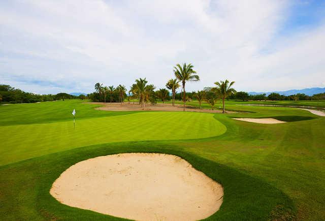 A view of a green protected by bunkers from The Greg Norman Signature Course at Vidanta Nuevo Vallarta