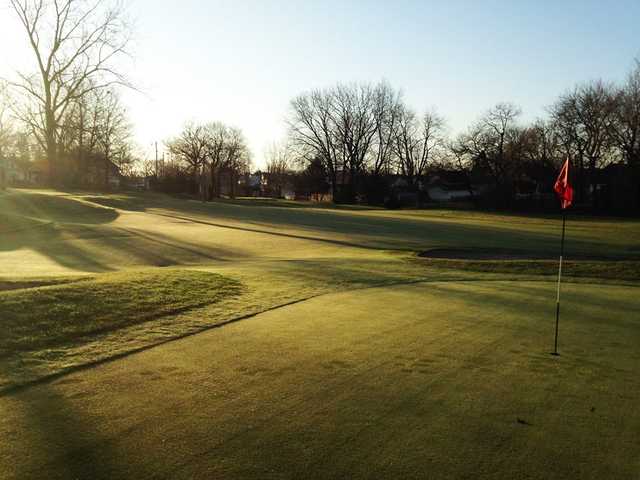 A sunny day view of a green at Washington Golf Learning Center
