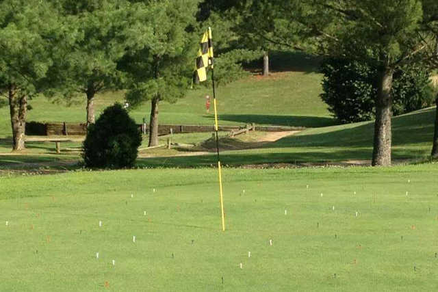 A sunny day view of a hole at Meigs Golf Course.