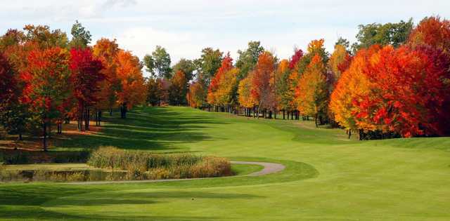 Fall view of the 17th hole and fairway at The Quest Golf Club