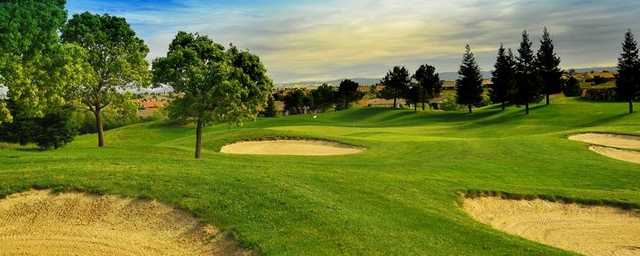 A view of bunkers and green in background at The Lincoln Hills Golf Club