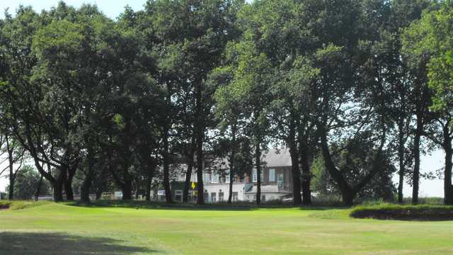 A sunny day view of a green at Whittington Heath Golf Club