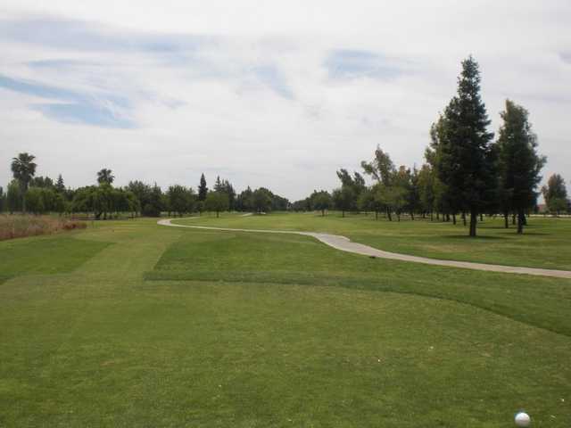 A view from Madera Municipal Golf Course with narrow road on the right