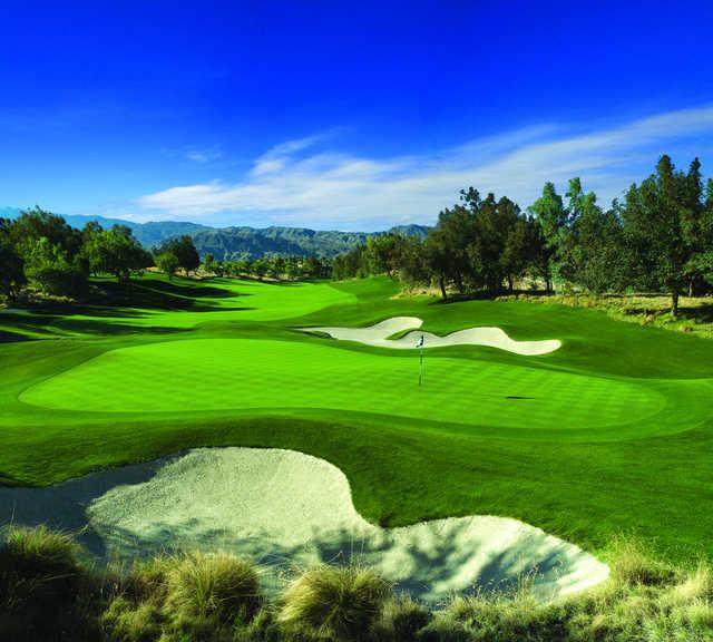 A view of the 1st hole surrounded by bunkers at Shadow Ridge Golf Club