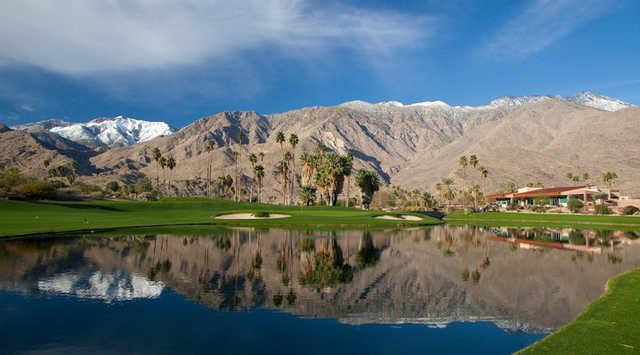 A view over the water of the clubhouse at South Course from Indian Canyons Golf Resort.