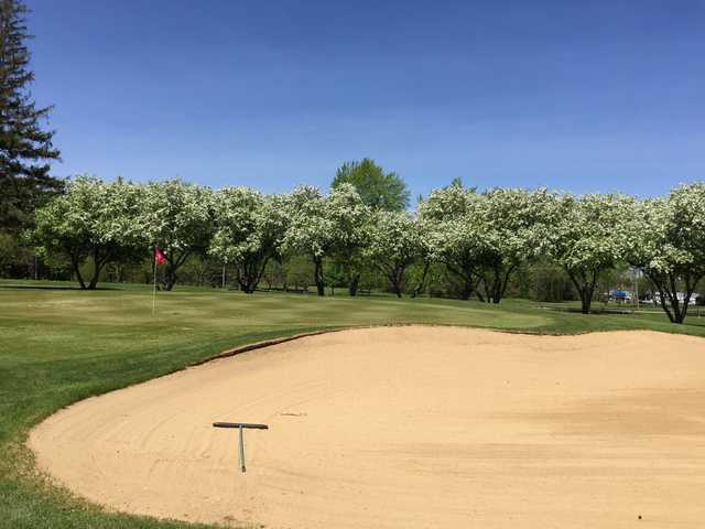 A view of a hole protected by a bunker at McHenry Country Club