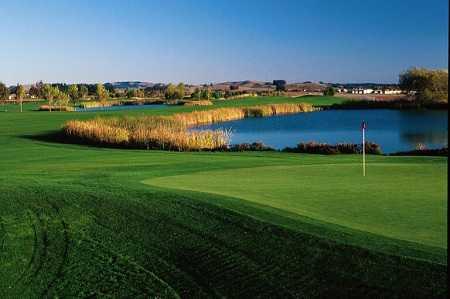 A view of green #9 with water on the right at Rooster Run Golf Club