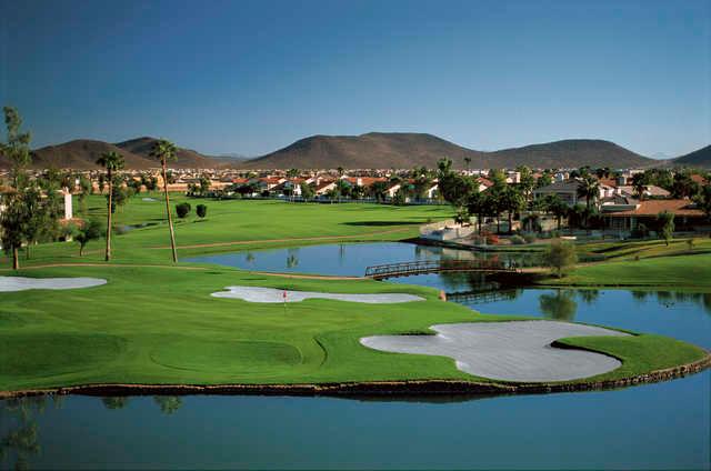 A view of a green with water and bunkers coming into play at Arrowhead Country Club.